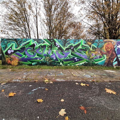 Light Green and Violet and Orange Characters by cbx and Acide4000. This Graffiti is located in Liège, Belgium and was created in 2022. This Graffiti can be described as Characters, Stylewriting and Wall of Fame.