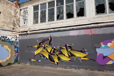 Beige and Colorful Stylewriting by Kan and TMF. This Graffiti is located in Erfurt, Germany and was created in 2020. This Graffiti can be described as Stylewriting and Abandoned.
