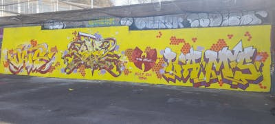 Yellow and Red Stylewriting by OATS, SAO2971 and LAMS. This Graffiti is located in St helier, Jersey and was created in 2023.