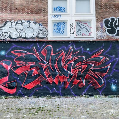 Red and Black Stylewriting by Fiks and MicRoFiks. This Graffiti is located in Amsterdam, Netherlands and was created in 2023.