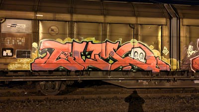 Coralle and Beige Stylewriting by DCK, Elmo and ALL CAPS COLLECTIVE. This Graffiti is located in Hungary and was created in 2020. This Graffiti can be described as Stylewriting, Trains and Freights.