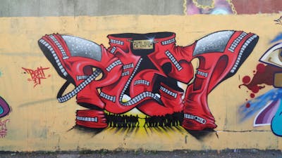 Red and Grey Stylewriting by PLET. This Graffiti is located in Milan, Italy and was created in 2022. This Graffiti can be described as Stylewriting and Characters.