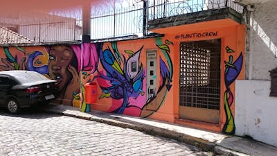 Colorful Characters by Plantio Crew. This Graffiti is located in Rio de Janeiro, Brazil and was created in 2016. This Graffiti can be described as Characters, Streetart and Commission.