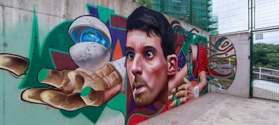 Cyan and Colorful Characters by Nexgraff. This Graffiti is located in donostia, Spain and was created in 2022. This Graffiti can be described as Characters, Murals and 3D.