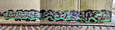 Light Green and Brown and Black Stylewriting by Muser, Spek and Cleo. This Graffiti is located in Nossen, Germany and was created in 2023. This Graffiti can be described as Stylewriting and Line Bombing.
