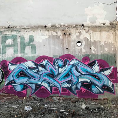 Violet and Colorful Stylewriting by News. This Graffiti is located in Walbrzych, Poland and was created in 2019. This Graffiti can be described as Stylewriting and Abandoned.