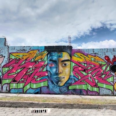 Coralle and Colorful Stylewriting by SILVER ONE. This Graffiti is located in Quito, Ecuador and was created in 2024. This Graffiti can be described as Stylewriting and Characters.