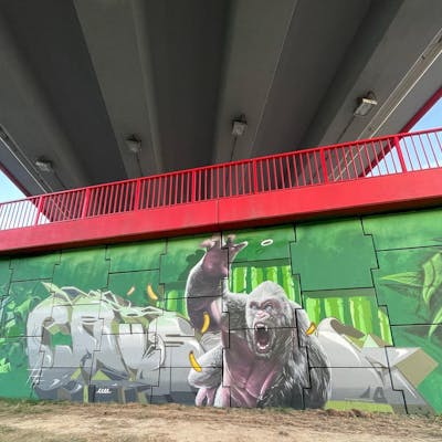 Grey and Light Green Stylewriting by cruze. This Graffiti is located in lublin, Poland and was created in 2021. This Graffiti can be described as Stylewriting, Characters and Wall of Fame.