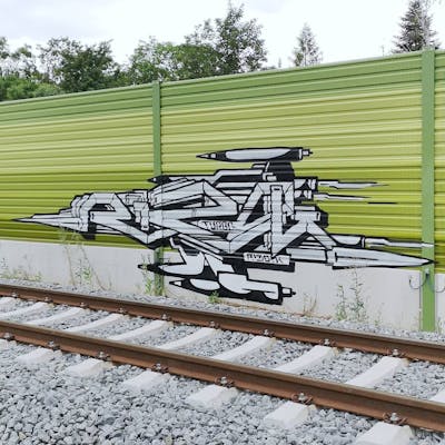 White and Black Stylewriting by bros, rizok and R120K. This Graffiti is located in Leipzig, Germany and was created in 2020. This Graffiti can be described as Stylewriting and Line Bombing.