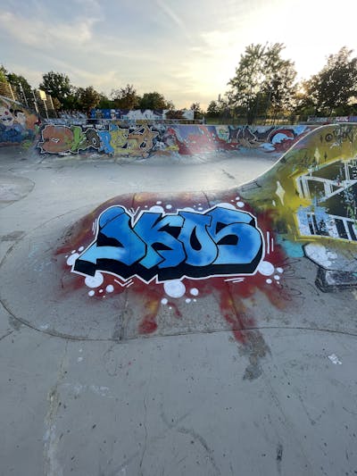 Blue Stylewriting by IKOS. This Graffiti is located in Germany and was created in 2022. This Graffiti can be described as Stylewriting and Wall of Fame.