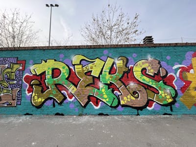 Colorful Stylewriting by REKS. This Graffiti is located in Bologna, Italy and was created in 2024. This Graffiti can be described as Stylewriting and Wall of Fame.