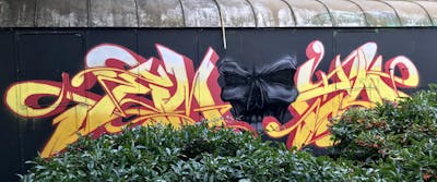 Yellow and Red Stylewriting by EmzG. This Graffiti is located in Zug, Switzerland and was created in 2022. This Graffiti can be described as Stylewriting and Characters.