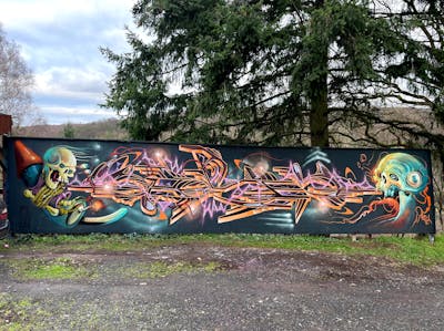 Colorful Characters by Gosp and Brainpaint circle. This Graffiti is located in Bad Hersfeld, Germany and was created in 2022. This Graffiti can be described as Characters, Stylewriting and Wall of Fame.