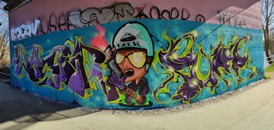 Violet and Light Green and Light Blue Stylewriting by Vysier64 and Puke. This Graffiti is located in Lübeck, Germany and was created in 2023. This Graffiti can be described as Stylewriting, Characters and Wall of Fame.