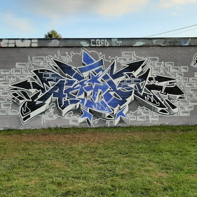 Light Blue and Grey Stylewriting by Acide4000 and cbx. This Graffiti is located in Liège, Belgium and was created in 2022. This Graffiti can be described as Stylewriting and Wall of Fame.