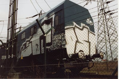 Chrome Stylewriting by urine, kafor and OST. This Graffiti is located in Bitterfeld, Germany and was created in 2002. This Graffiti can be described as Stylewriting, Trains and Freights.