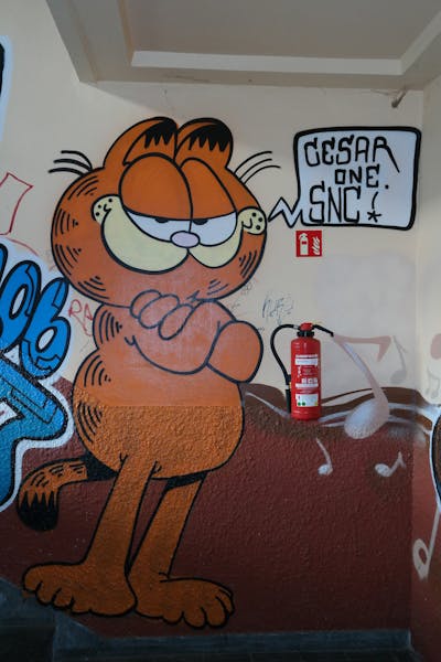 Orange Characters by CesarOne.SNC. This Graffiti is located in Wiesbaden, Germany and was created in 2017.