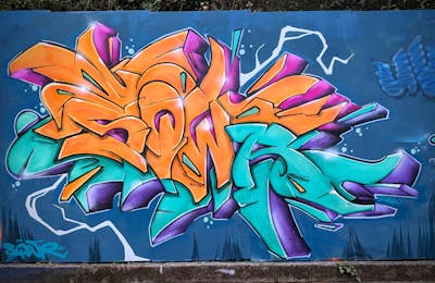 Orange and Cyan and Colorful Stylewriting by SQWR. This Graffiti is located in United Kingdom and was created in 2024.