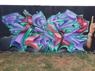 Cyan and Violet Stylewriting by Tinto 247. This Graffiti is located in Sevilla, Spain and was created in 2022. This Graffiti can be described as Stylewriting and 3D.