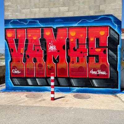 Red and Light Blue and Grey Stylewriting by Vamos and gipsy kings. This Graffiti is located in Valencia, Spain and was created in 2022. This Graffiti can be described as Stylewriting and Wall of Fame.