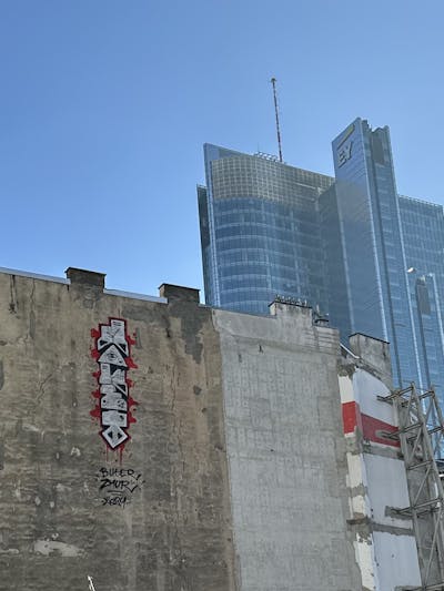 Chrome Stylewriting by Monet. This Graffiti is located in Warsaw, Poland and was created in 2024. This Graffiti can be described as Stylewriting and Street Bombing.