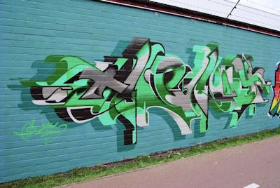 Light Green and Grey Stylewriting by Heny - Alfa crew and Heny. This Graffiti is located in Antwerp, Belgium and was created in 2022.