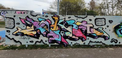 Grey and Colorful and Black Stylewriting by Deki and AF Crew. This Graffiti is located in Wolfenbüttel, Germany and was created in 2022. This Graffiti can be described as Stylewriting and Wall of Fame.