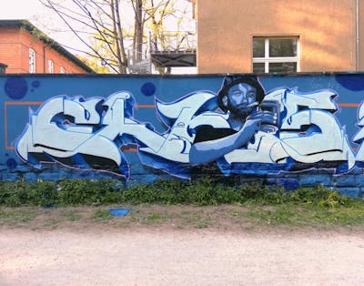Light Blue and Blue Stylewriting by Chr15. This Graffiti is located in Jena, Germany and was created in 2022. This Graffiti can be described as Stylewriting and Characters.