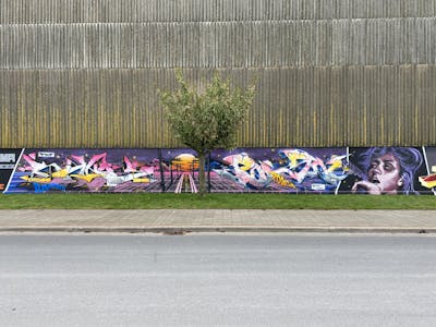 Colorful Stylewriting by shmri, Posa, TMF and Randy. This Graffiti is located in Bremerhaven, Germany and was created in 2022. This Graffiti can be described as Stylewriting, Characters and Wall of Fame.