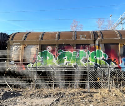 Light Green and Colorful Stylewriting by REKS. This Graffiti is located in Italy and was created in 2023. This Graffiti can be described as Stylewriting, Trains and Freights.