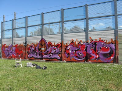 Violet and Red Stylewriting by mobar, Chr15 and Pames. This Graffiti is located in Milan, Italy and was created in 2017. This Graffiti can be described as Stylewriting and Characters.