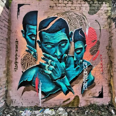Cyan and Coralle Characters by REVES ONE. This Graffiti is located in London, United Kingdom and was created in 2022. This Graffiti can be described as Characters and Abandoned.