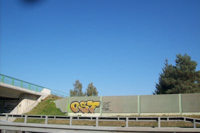 Yellow and Brown Stylewriting by urine, mobar, Pizar and OST. This Graffiti is located in Leipzig, Germany and was created in 2011. This Graffiti can be described as Stylewriting and Street Bombing.