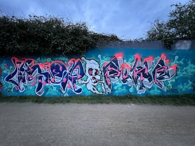 Blue and Colorful Stylewriting by Vysier64 and Puke. This Graffiti is located in Lübeck, Germany and was created in 2023. This Graffiti can be described as Stylewriting, Characters and Wall of Fame.