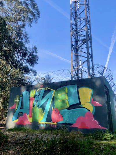 Cyan and Colorful Stylewriting by Dr. Hione. This Graffiti is located in Portugal and was created in 2024. This Graffiti can be described as Stylewriting and Wall of Fame.