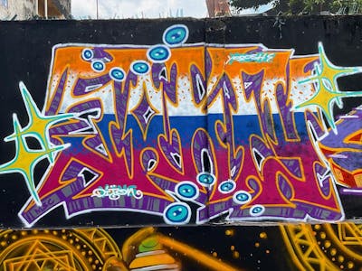 Orange and Colorful Stylewriting by M3C and Sakey. This Graffiti is located in Jambi City, Indonesia and was created in 2022.