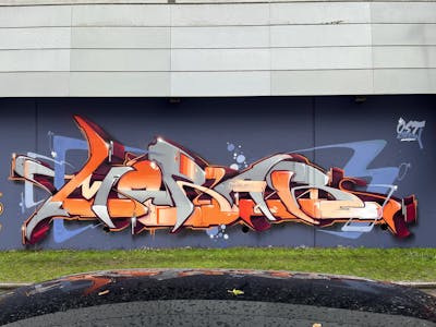 Orange and Colorful Stylewriting by mobar and Ost crew. This Graffiti is located in Salzburg, Austria and was created in 2022. This Graffiti can be described as Stylewriting and Wall of Fame.