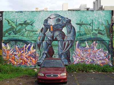 Colorful Stylewriting by REK and SKE. This Graffiti is located in San Juan, Puerto Rico and was created in 2011. This Graffiti can be described as Stylewriting and Characters.