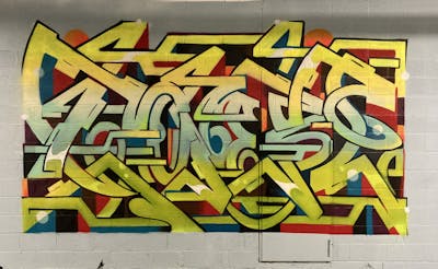 Colorful Stylewriting by Toner2 and OTZ Crew. This Graffiti is located in Louvain-La-Neuve, Belgium and was created in 2023.