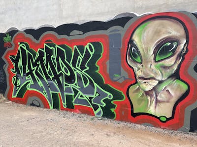 Black and Red and Light Green Stylewriting by Vamos. This Graffiti is located in Valencia, Spain and was created in 2023. This Graffiti can be described as Stylewriting and Characters.