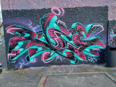 Cyan and Black and Coralle Stylewriting by Dyze. This Graffiti is located in Switzerland and was created in 2023.