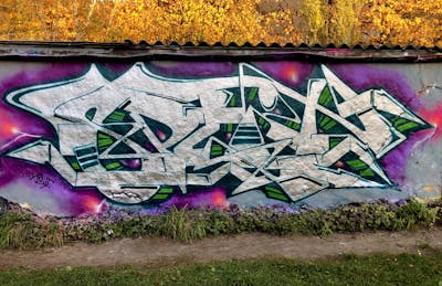 Chrome and Cyan Wall of Fame by split. This Graffiti is located in Germany and was created in 2022. This Graffiti can be described as Wall of Fame and Stylewriting.