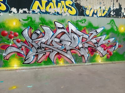 Chrome and Colorful Stylewriting by Sevenhells and Imor. This Graffiti is located in Aschersleben, Germany and was created in 2023. This Graffiti can be described as Stylewriting and Wall of Fame.