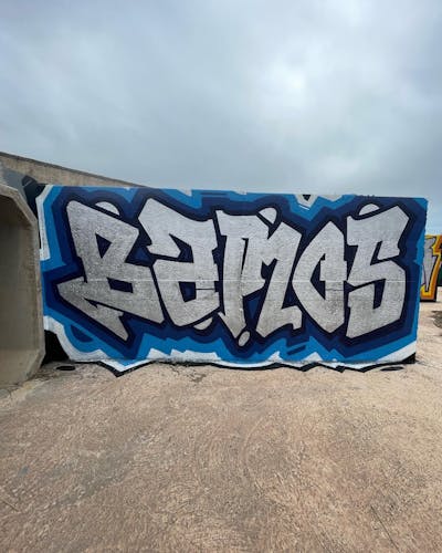 Chrome and Blue Stylewriting by Bamos. This Graffiti is located in Valencia, Spain and was created in 2023.