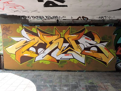 Brown and Orange Stylewriting by News. This Graffiti is located in Eindhoven, Netherlands and was created in 2014. This Graffiti can be described as Stylewriting and Wall of Fame.