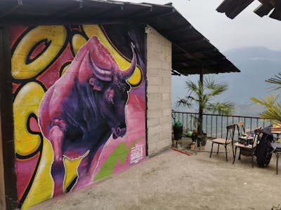 Coralle and Violet and Yellow Characters by 23M Graphics. This Graffiti is located in Sapa, Viet Nam and was created in 2024. This Graffiti can be described as Characters and Streetart.