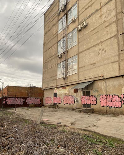 Coralle and Black Street Bombing by Fank and Bstr. This Graffiti is located in Russian Federation and was created in 2021. This Graffiti can be described as Street Bombing, Abandoned and Throw Up.