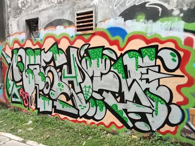 Chrome and Green and Red Stylewriting by Neshtle. This Graffiti is located in Jakarta, Indonesia and was created in 2022.