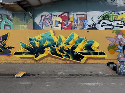 Yellow and Cyan Stylewriting by Jaek. This Graffiti is located in Luxembourg, Luxembourg and was created in 2024. This Graffiti can be described as Stylewriting and Wall of Fame.