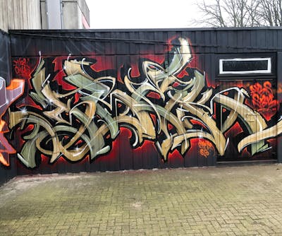 Beige and Red Stylewriting by ABS and Sbecky. This Graffiti is located in Oldenburg, Germany and was created in 2020. This Graffiti can be described as Stylewriting and Handstyles.